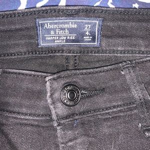 Women's Abercrombie black skinny ankle jeans- 27/4L. Frayed bottoms.